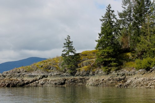At the little beach at the base of her street.  